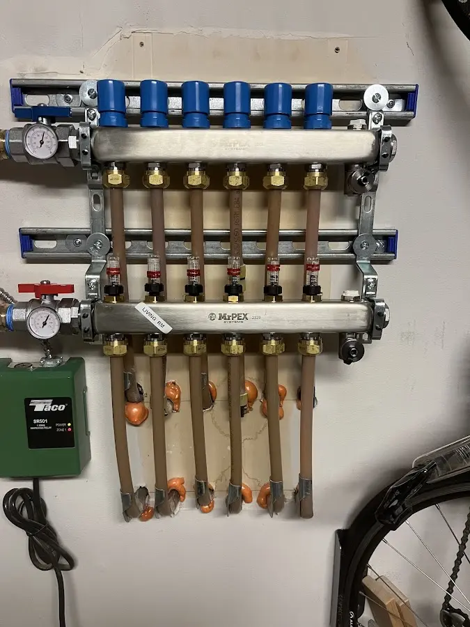 Plumber performing Water Heater Repair at a residential property in Rathdrum